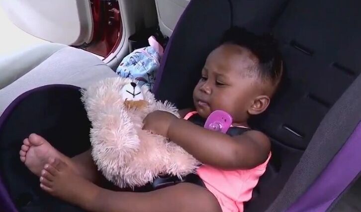 CHILD IN CAR SEAT